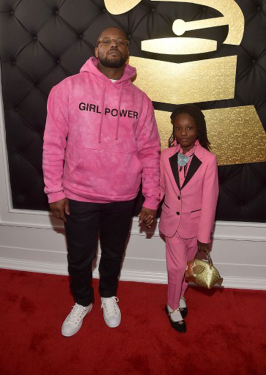 Schoolboy Q and his daughter (photo c/o AFP)